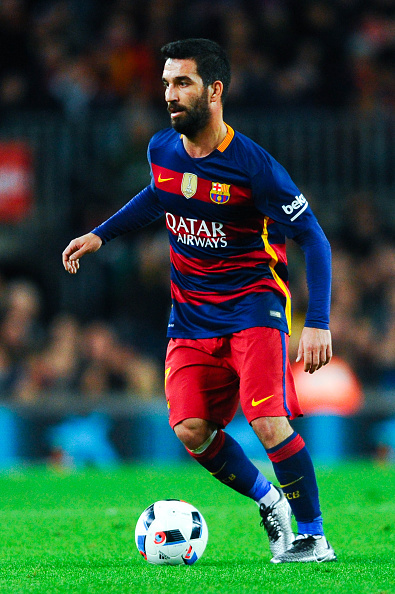 BARCELONA, SPAIN - JANUARY 06: Arda Turan of FC Barcelona runs with the ball during the Copa del Rey Round of 16 first leg match between FC Barcelona and RCD Espanyol at Camp Nou on January 6, 2016 in Barcelona, Spain. (Photo by David Ramos/Getty Images)