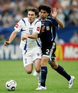 GELSENKIRCHEN, GERMANY - JUNE 16: Roberto Ayala of Argentina battles with Ivan Ergic of Serbia & Montenegro during the FIFA World Cup Germany 2006 Group C match between Argentina and Serbia & Montenegro at the Stadium Gelsenkirchen on June 16, 2006 in Gelsenkirchen, Germany. (Photo by Christof Koepsel/Bongarts/Getty Images)